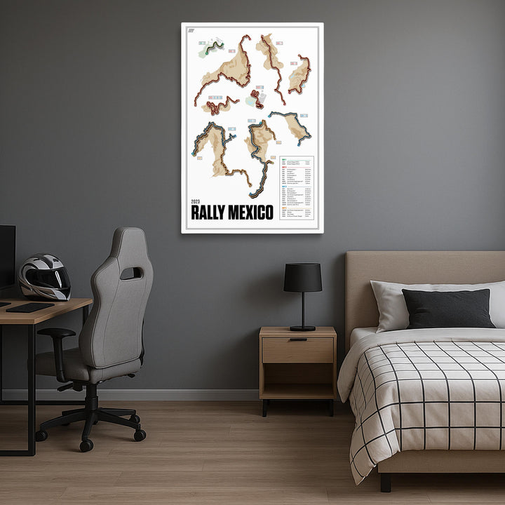 Room interior with a map of Rally Mexico on the wall, bed, desk, and chair.