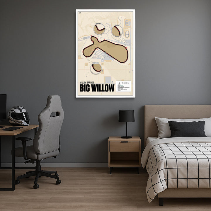 Modern bedroom with a bed, desk, and chair, featuring a framed map of Big Willow, Willow Springs on the wall.