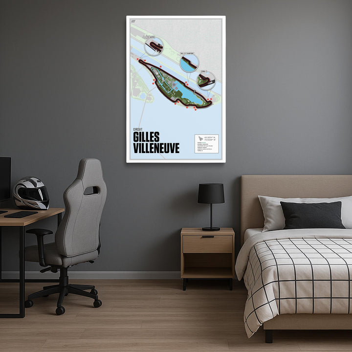 Modern bedroom with a framed map of Gilles Villeneuve on the wall, desk, chair, and bed.
