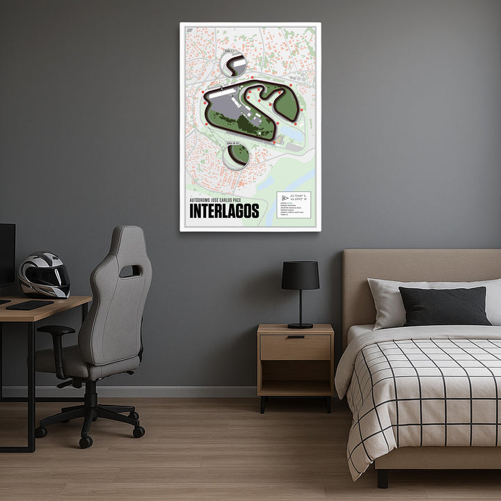 Bedroom with a map of Interlagos on the wall, desk, chair, and bed.