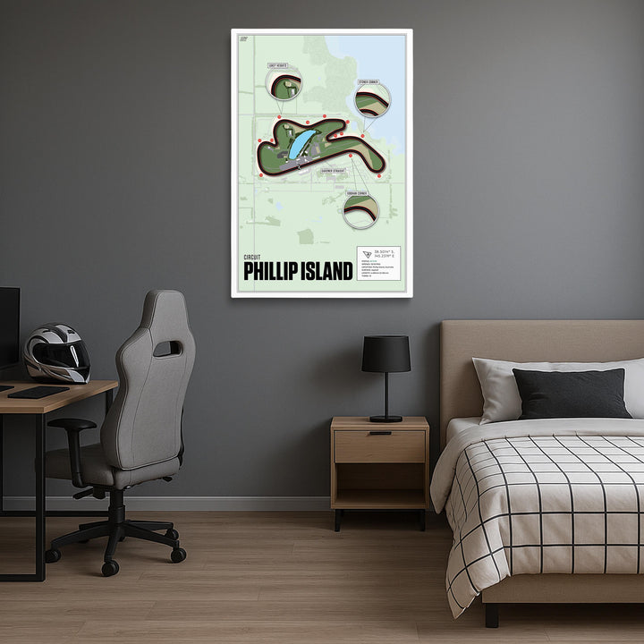Room interior with a bed, desk, and wall art of Phillip Island.