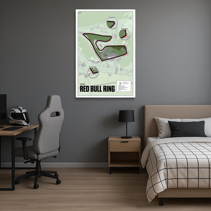 Room interior with a bed, desk, and wall art of Red Bull Ring.